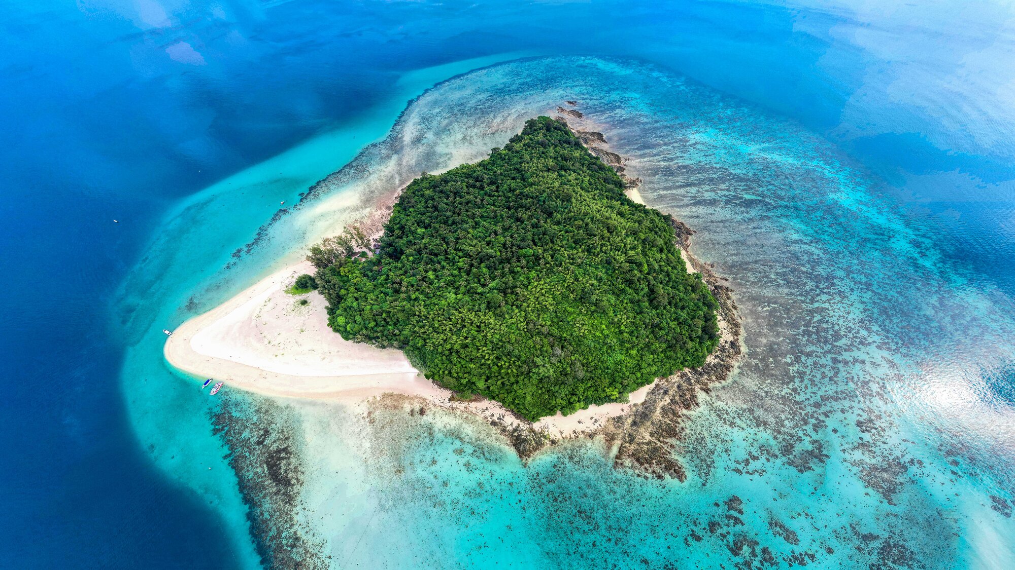 Aerial view of Bamboo Island and its ring of white sand