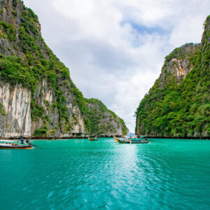 Boats in the emerald water of Pileh Lagoon