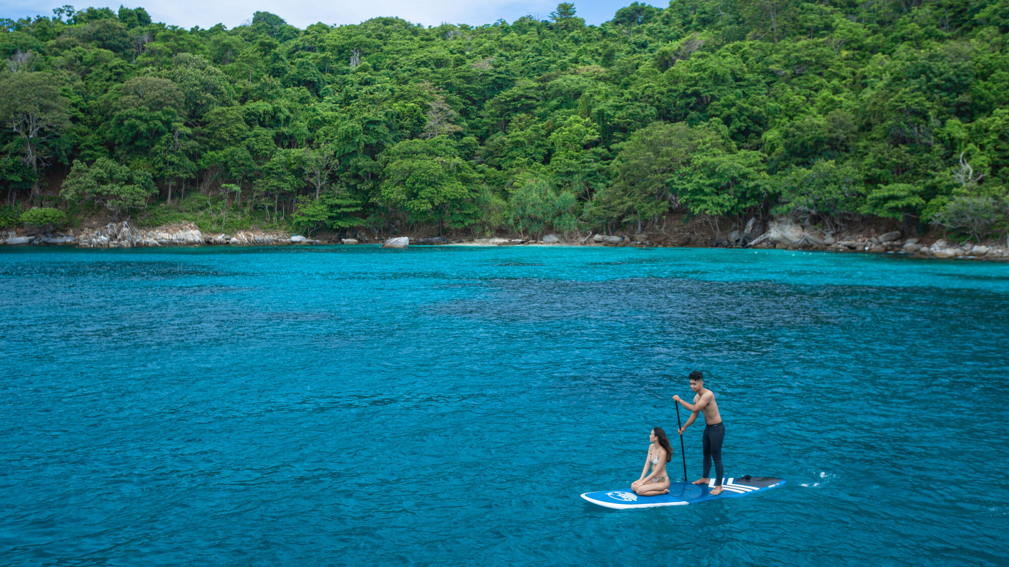 Paddleboarding in clear water in the Phi Phi Islands