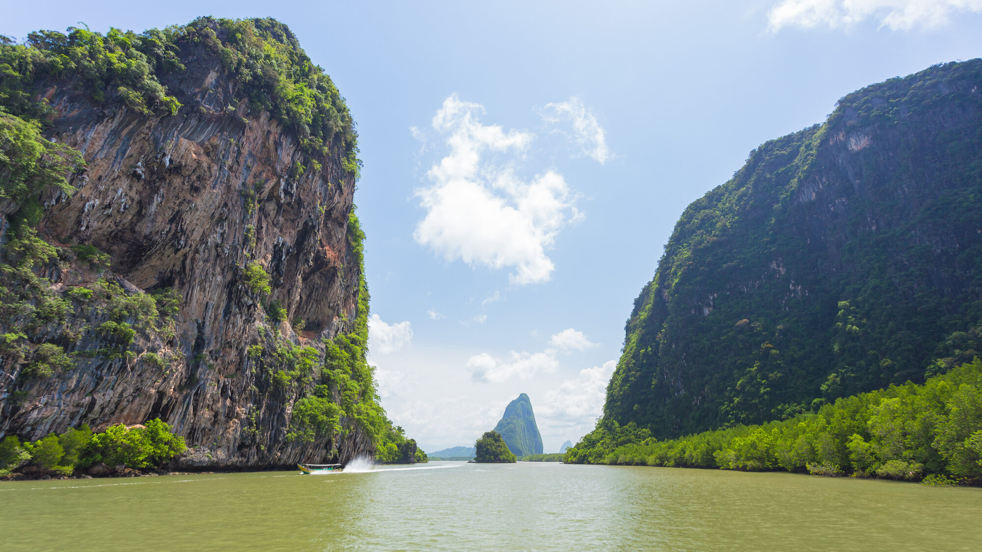 Limestone cliffs rising from Phang Nga Bay