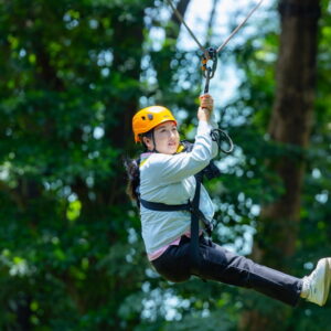 Rider on a zipline in the Khao Lak rainforest