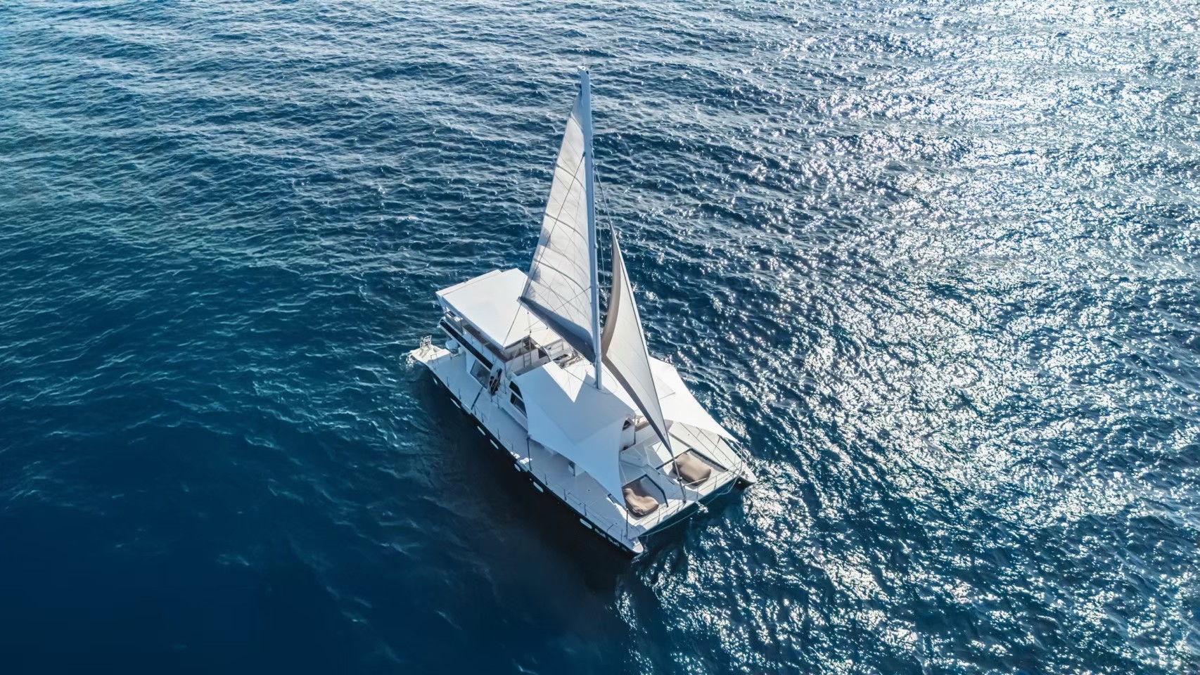 Luxury yacht under sail near Phuket, seen from above