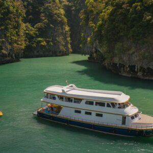 Tour boat in a sheltered bay in Phang Nga