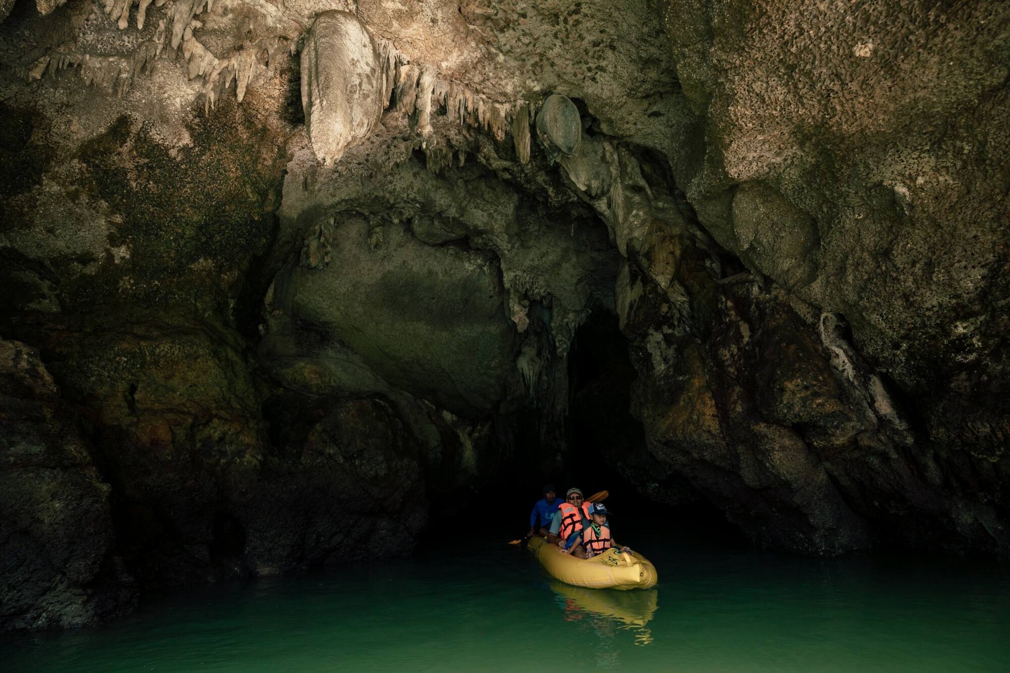 Kayak at a sea cave entrance