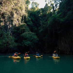 Kayaks crossing a hidden hong lagoon