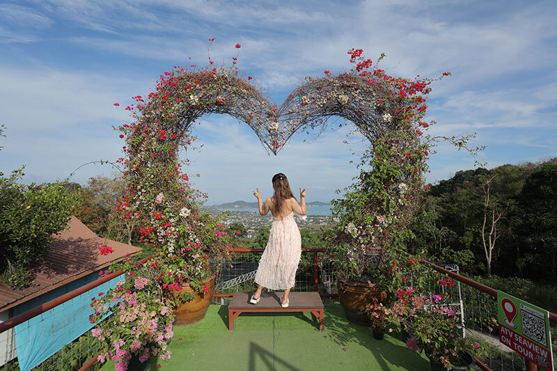 Heart-shaped flower arch at a Phuket viewpoint