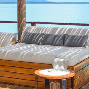 Cushioned daybed with a view of the bay