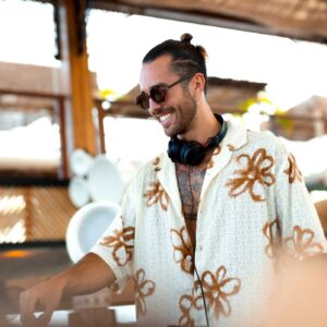 DJ playing at the beach club