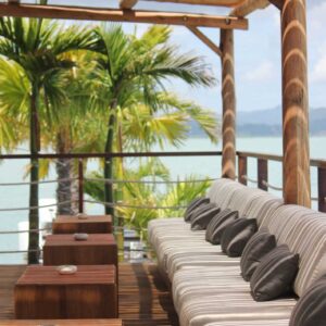 Lounge terrace with sea view under a bamboo roof