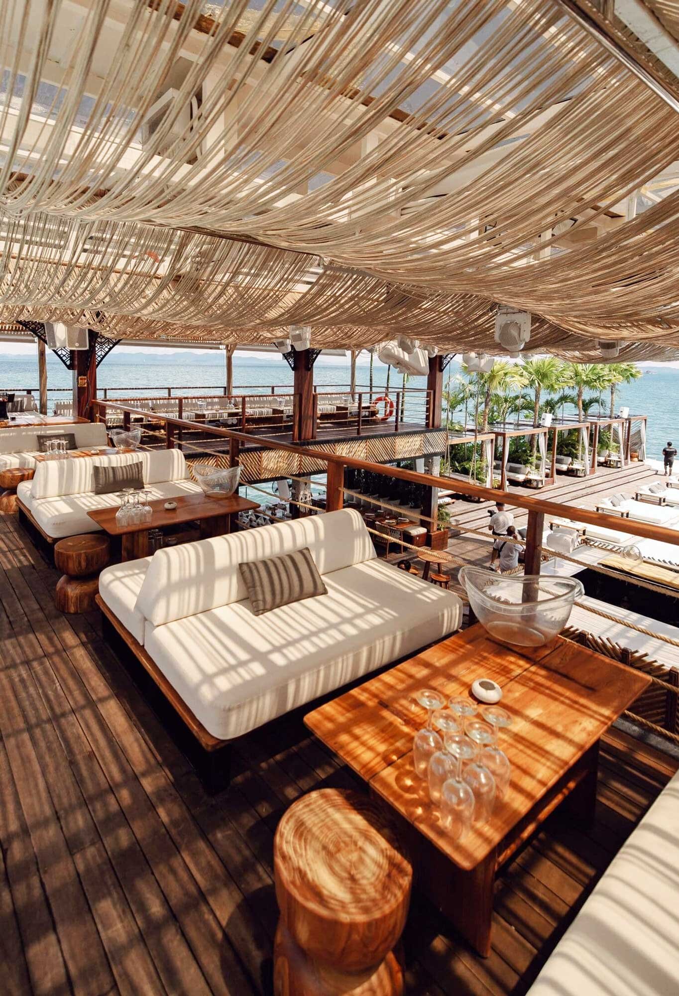 Shaded lounge area with sofas and tables