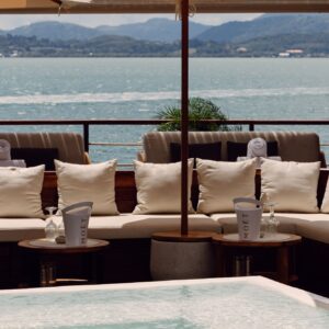 Terrace with umbrellas and a plunge pool facing the sea