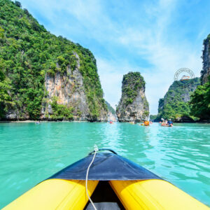 View from a canoe gliding toward the karsts of Phang Nga Bay