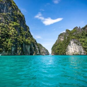 Limestone cliffs around the turquoise water of Pileh Lagoon