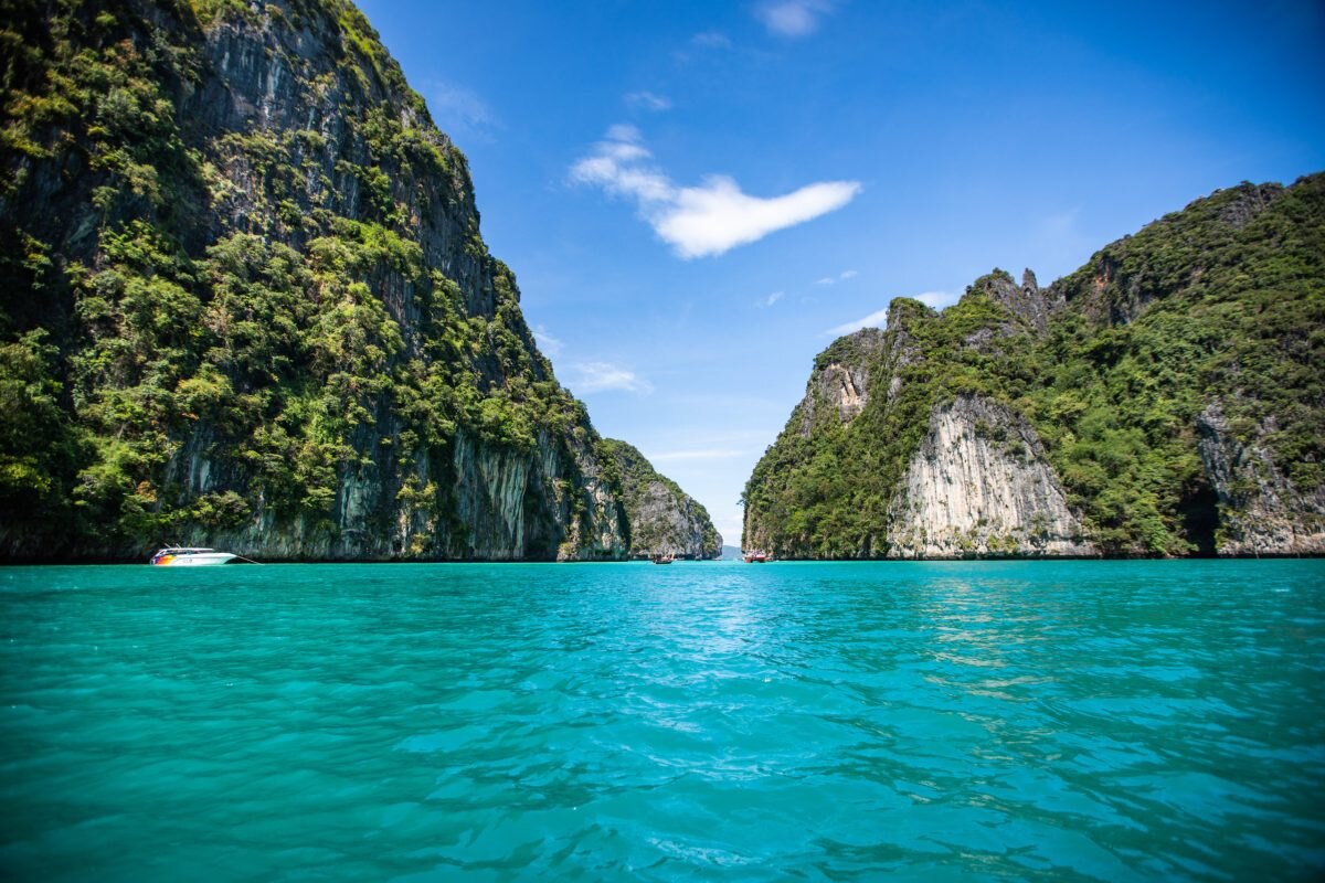 Limestone cliffs around the turquoise water of Pileh Lagoon