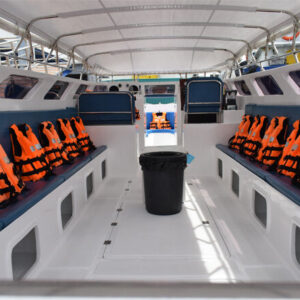 Shaded seating and life jackets inside a private speedboat