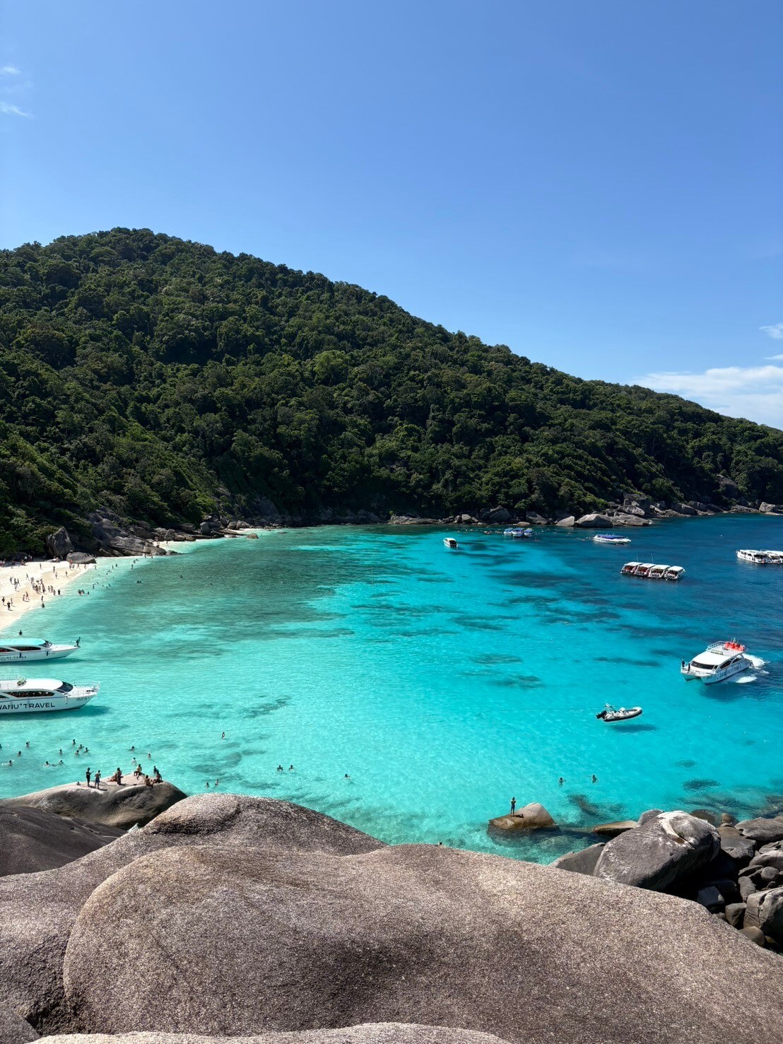 Turquoise bay framed by granite boulders in the Similan Islands