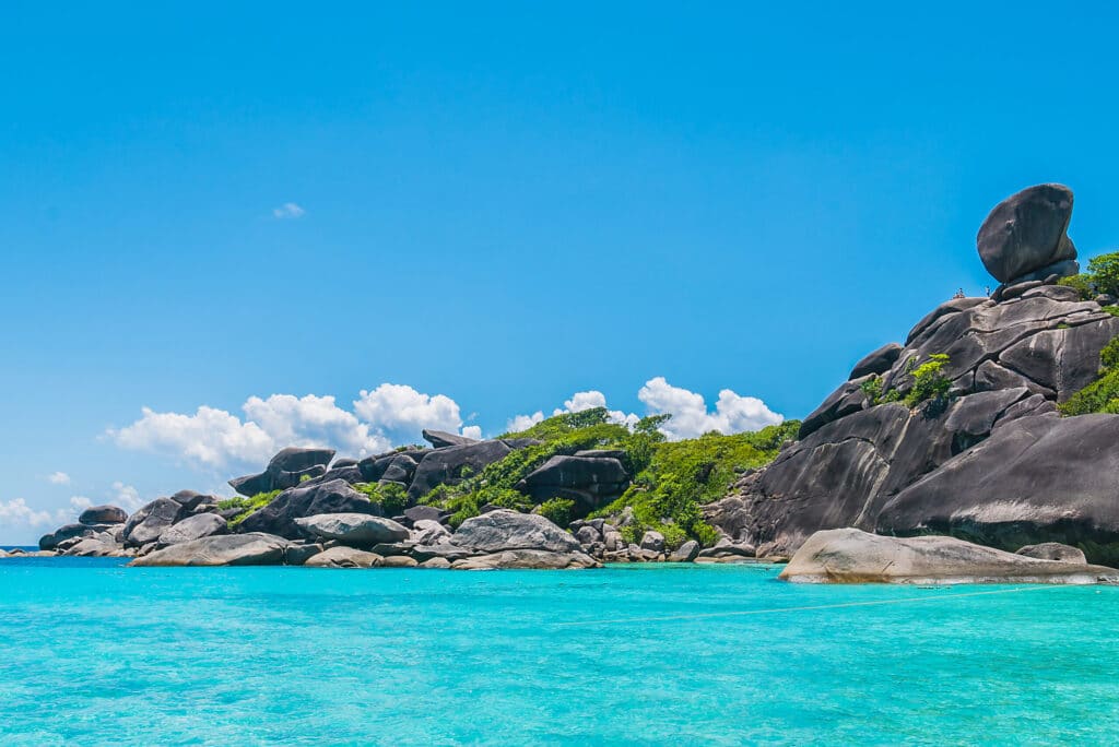 Sail Rock above the turquoise water of the Similan Islands