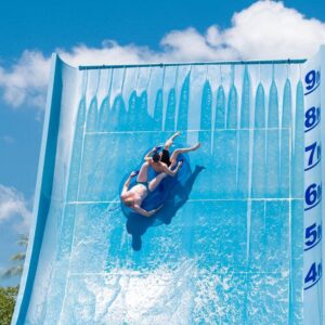 Guest riding a steep wave slide at Splash Jungle Water Park, Phuket