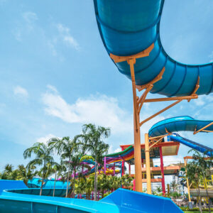 Blue open and tube slides at Splash Jungle Water Park in Phuket