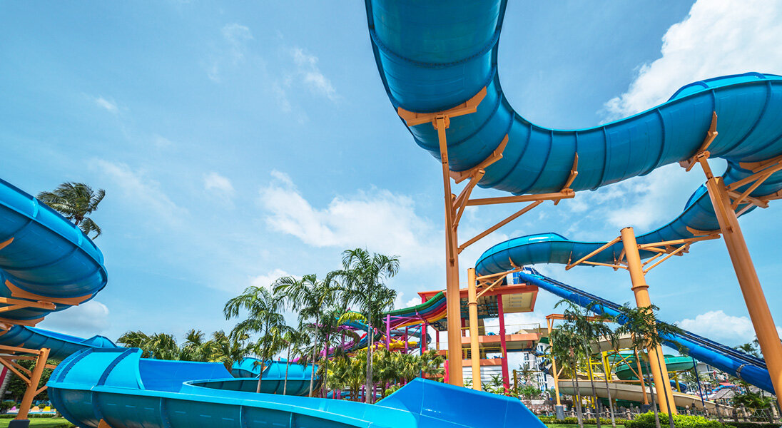 Blue open and tube slides at Splash Jungle Water Park in Phuket
